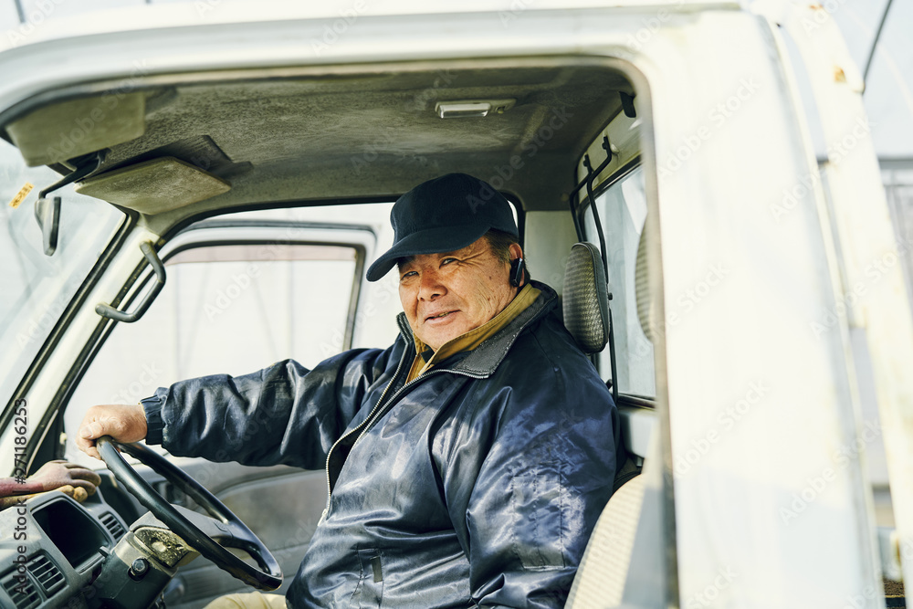 Portrait of mature man sitting in car Portrait of mature man sitting in car