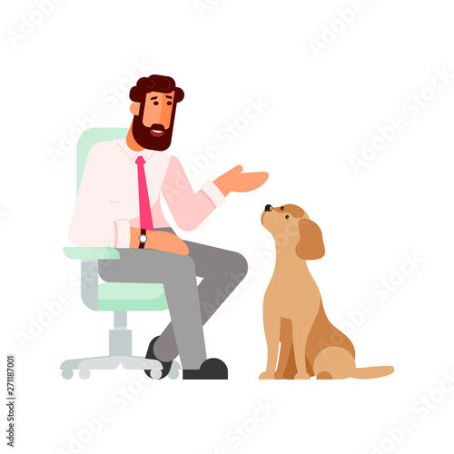 Young man talking to his dog