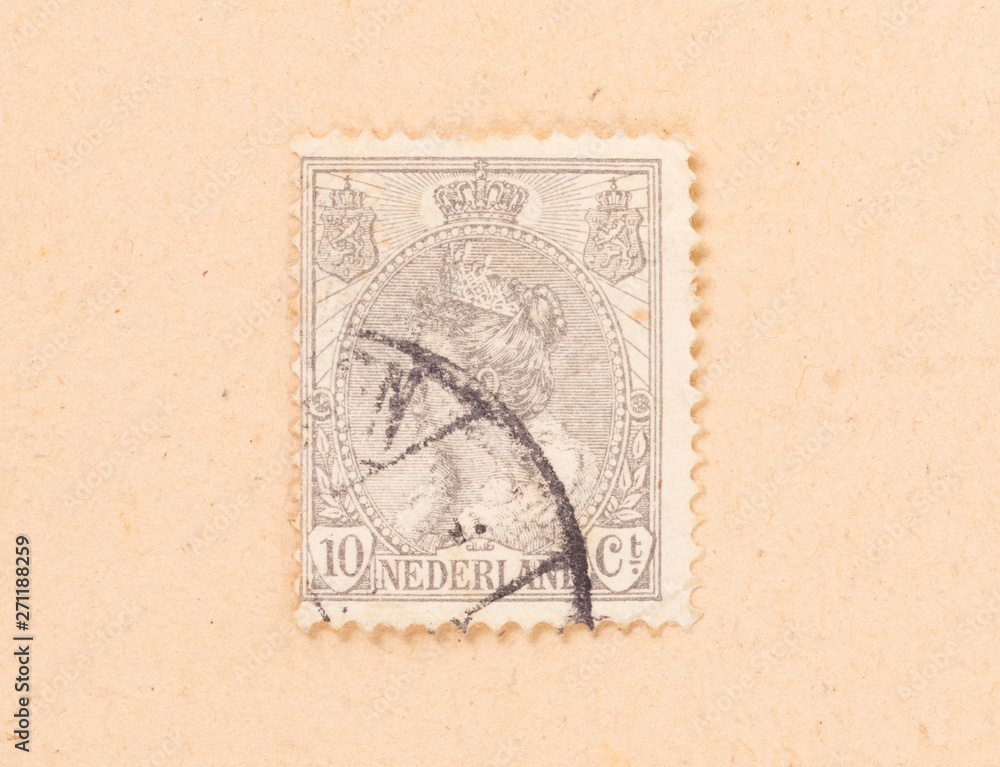 THE NETHERLANDS 1950: A stamp printed in the Netherlands shows the queen, circa 1950