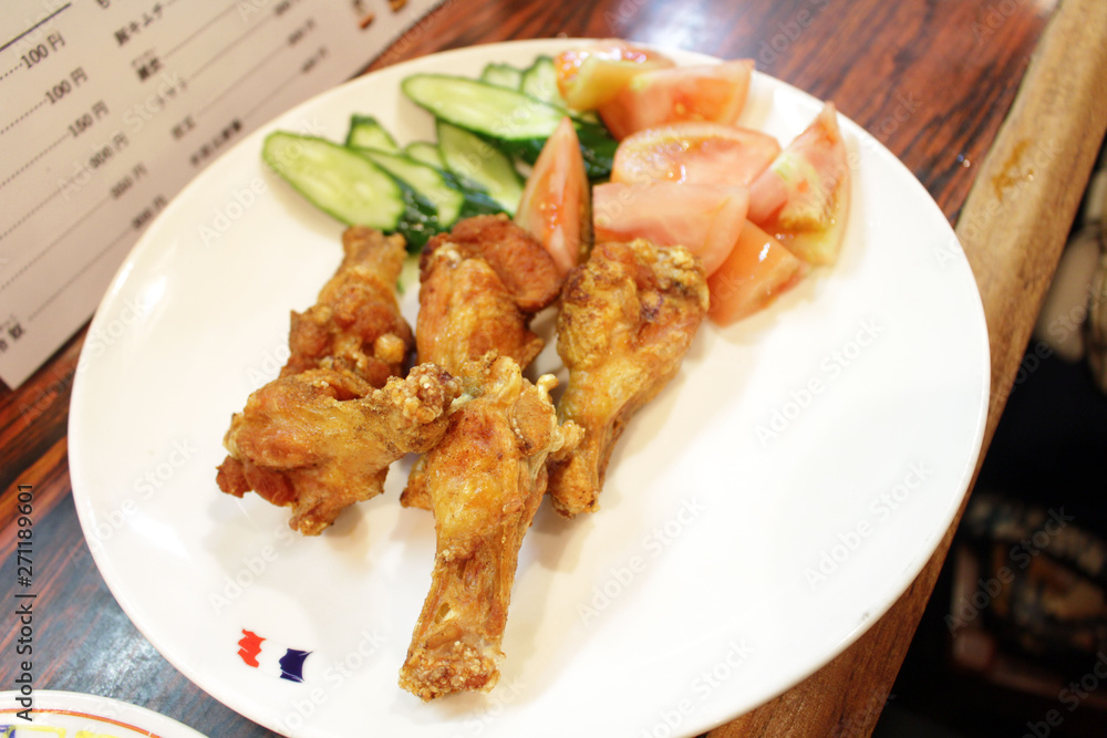 Japanese fried chicken served at traditional izakaya Japanese fried chicken served at traditional izakaya
