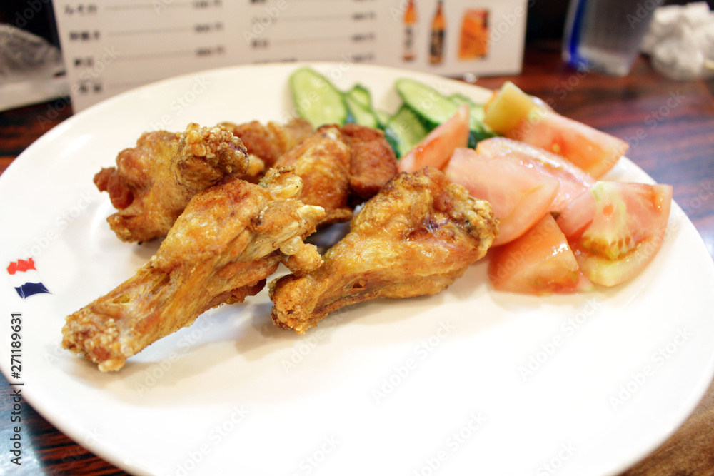 Japanese fried chicken served at traditional izakaya Japanese fried chicken served at traditional izakaya