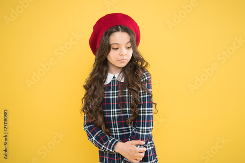 Fashion girl. Fashionable accessory. Teenage fashion. French fashion. Child small girl happy smiling baby. Happy childhood. Pure beauty. Kid little cute fashion girl posing with long hair and hat