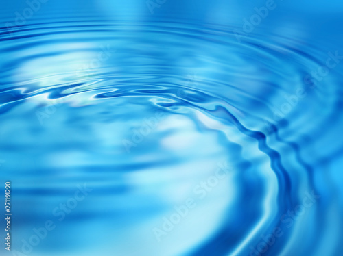 Bright blue abstract background with water ripples pattern