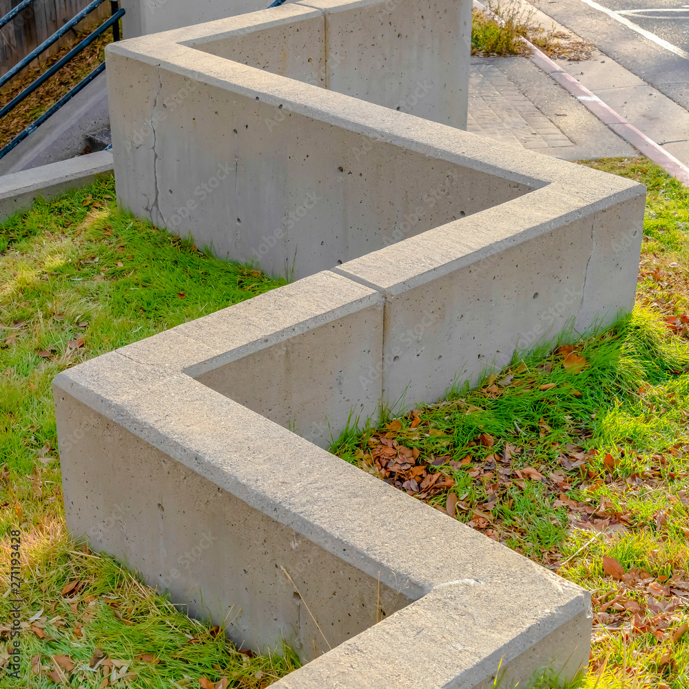 Square Concrete block barrier connected to an outdoor stairs in Salt Lake City Square Concrete block barrier connected to an outdoor stairs in Salt Lake City