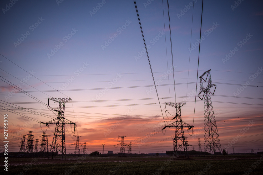 Silhouette of Power Supply Facilities at Sunset