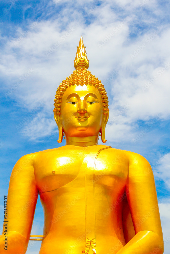 Big Golden Buddha with blue sky blue at Wat Muang, Ang Thong Province, Thailand Big Golden Buddha with blue sky blue at Wat Muang, Ang Thong Province, Thailand