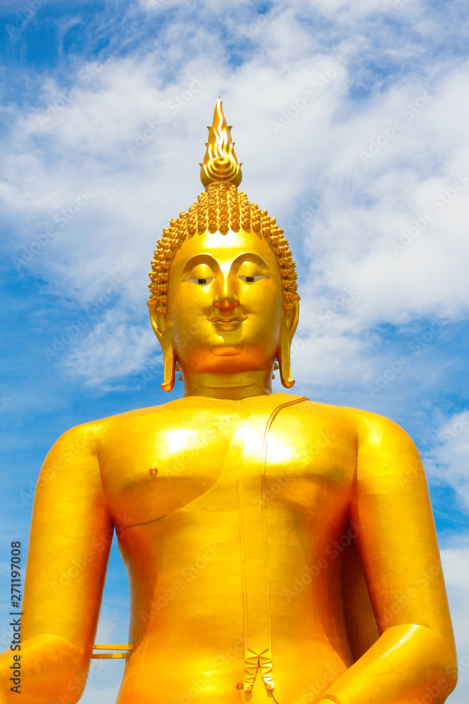 Big Golden Buddha with blue sky blue at Wat Muang, Ang Thong Province, Thailand Big Golden Buddha with blue sky blue at Wat Muang, Ang Thong Province, Thailand