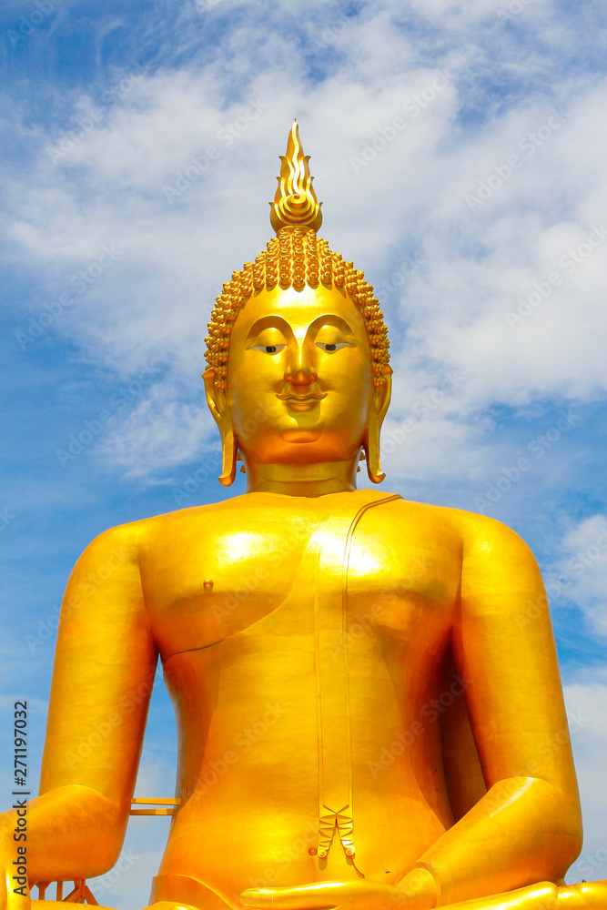 Big Golden Buddha with blue sky blue at Wat Muang, Ang Thong Province, Thailand Big Golden Buddha with blue sky blue at Wat Muang, Ang Thong Province, Thailand