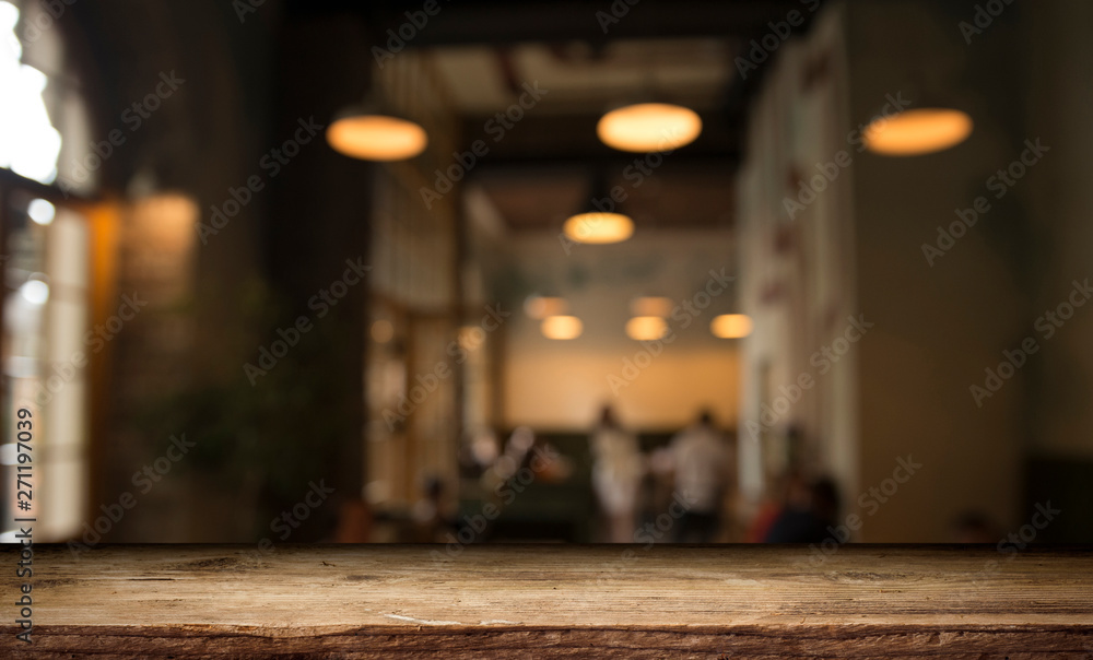 blurred background of bar and dark brown desk space of retro wood blurred background of bar and dark brown desk space of retro wood