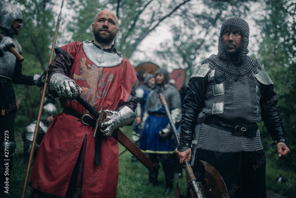 Obraz premium Battle squad of medieval knights of the Crusaders with weapons.