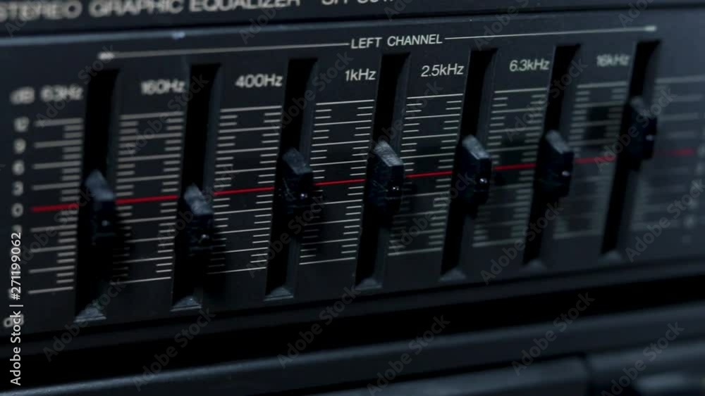 A machine with slider knobs and frequencies. Late 1900s technology concept. A machine with slider knobs and frequencies. Late 1900s technology concept.
