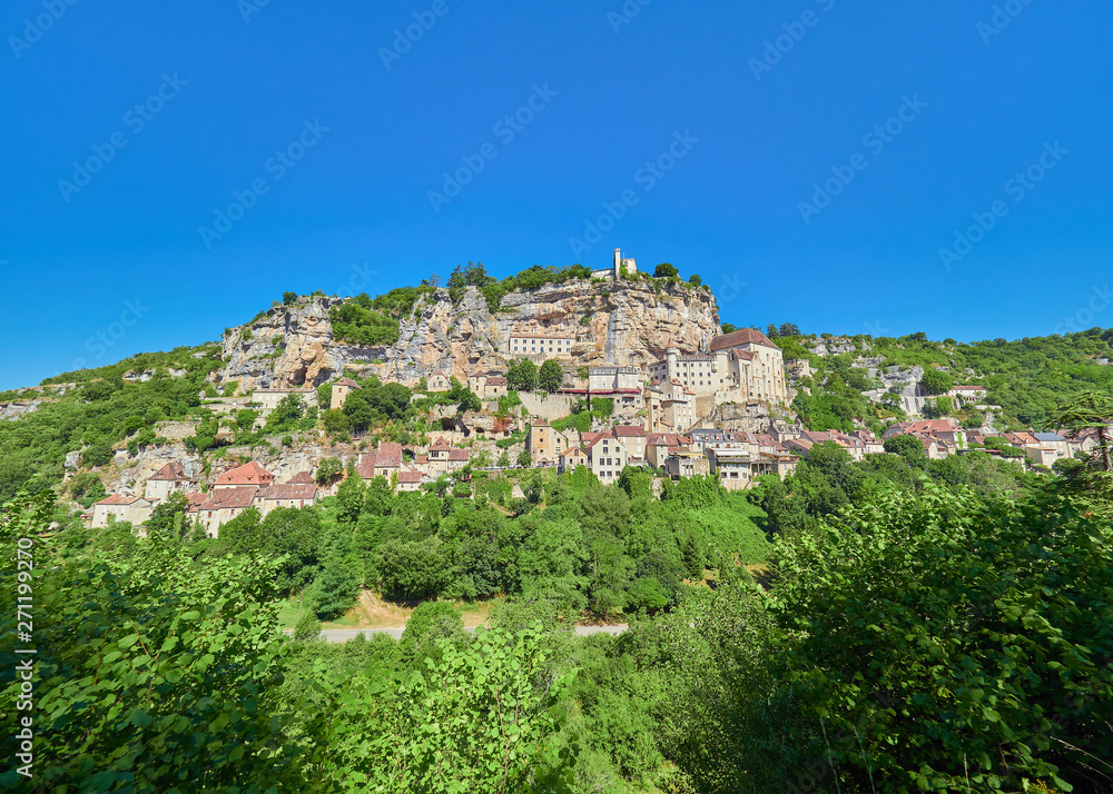 Landscape panoramic view of the medieval french village of Rocamadour, on a cliff of the alzou (dordogne) river valley, Lot Department, Quercy, Occitanie Region, France. UNESCO world heritage site.