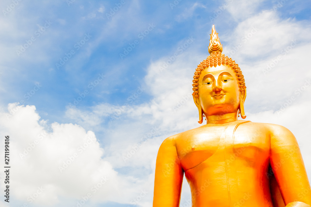 Big Golden Buddha with blue sky blue at Wat Muang, Ang Thong Province, Thailand Big Golden Buddha with blue sky blue at Wat Muang, Ang Thong Province, Thailand