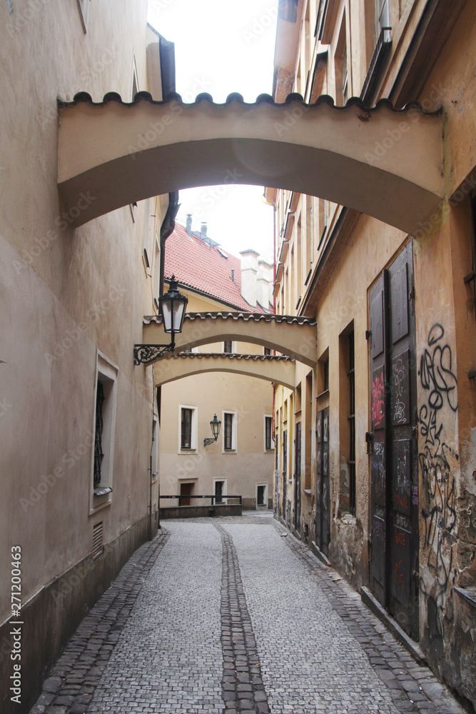 Fototapeta premium An old narrow street in Prague