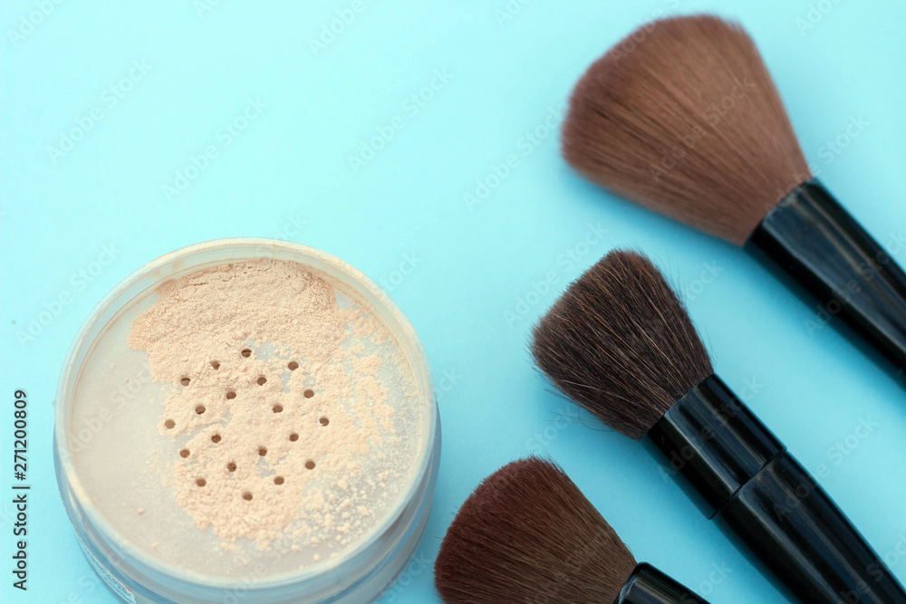 make up brushes cosmetics blue background copy space make up brushes cosmetics blue background copy space