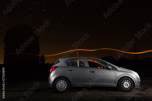 Fototapeta Naklejka Na Ścianę i Meble -  Car and observatory under the stars in Calar Alto Almeria
