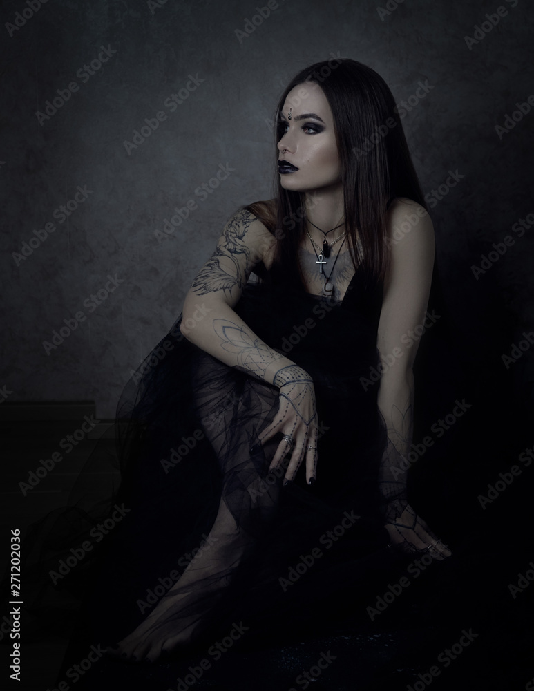 Gothic style woman portrait in black. Halloween black dark witch Stock  Photo