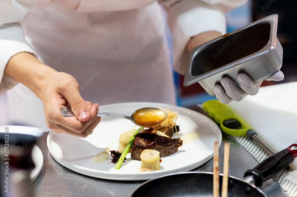 Chef preparing food, meal, in the kitchen, chef cooking Chef preparing food, meal, in the kitchen, chef cooking