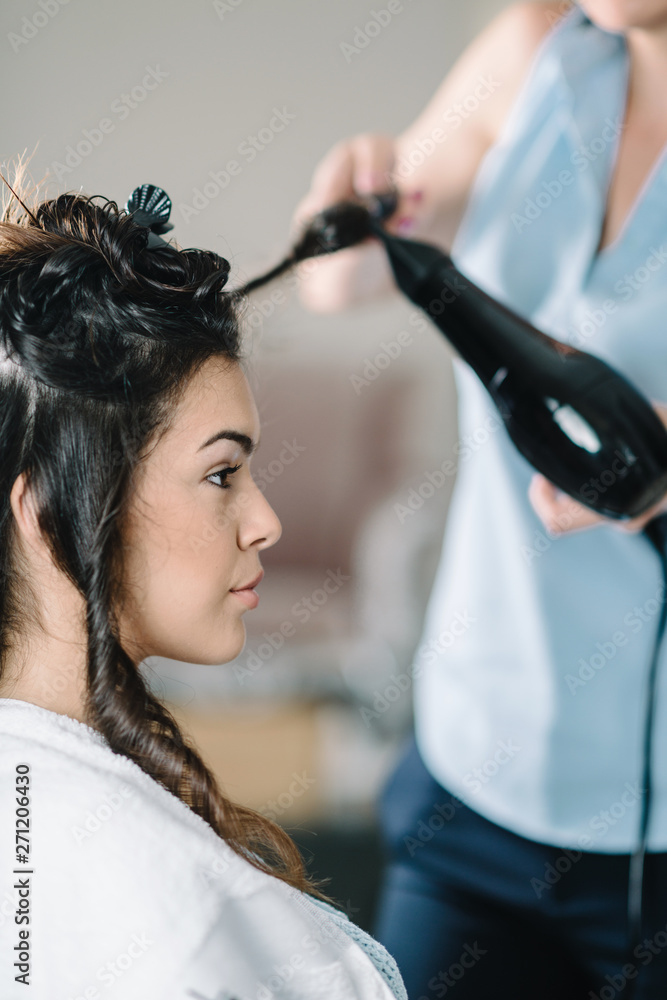 Fototapeta premium Drying hair in hair salon