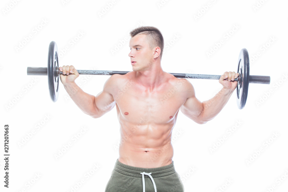 Muscular man working out in studio doing exercises with barbell at biceps, strong male naked torso abs. Isolated on white background. Copy Space. Muscular man working out in studio doing exercises with barbell at biceps, strong male naked torso abs. Isolated on white background. Copy Space.