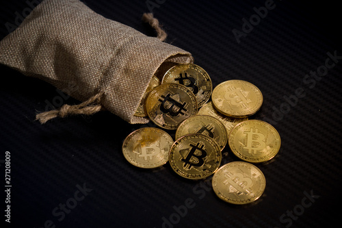 bit coin in bucket falling blockchain technology