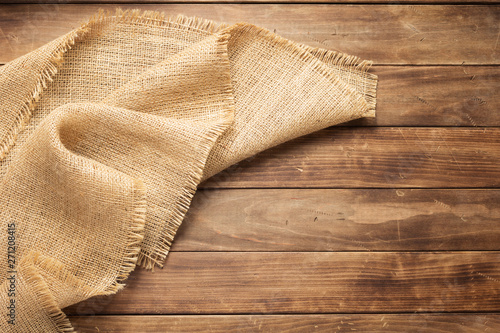 Bilde på lerret burlap hessian sacking on wooden background