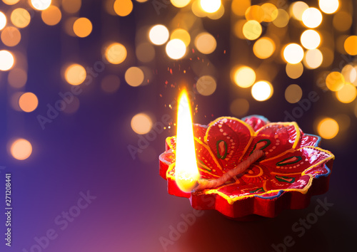 Diya lamp lit during diwali celebration