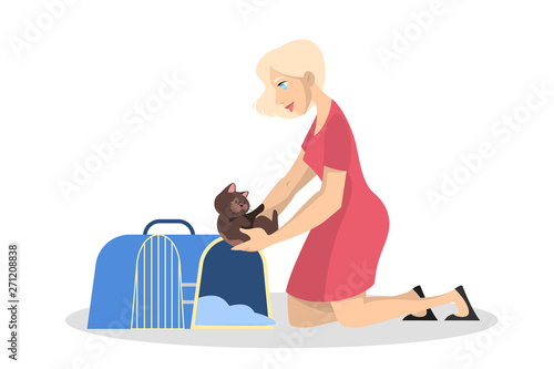 Beautiful woman in red dress holding little kitten