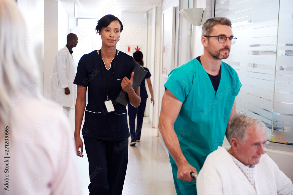 Fototapeta premium Busy Hospital Corridor With Medical Staff And Patients