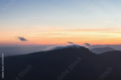 The sunrise view with mist on the mountian at Pha Mor E Dang, Khao Phra Wihan National Park, Thailand.