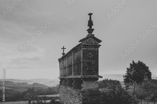 Galician horreo in black and white, at the countryside