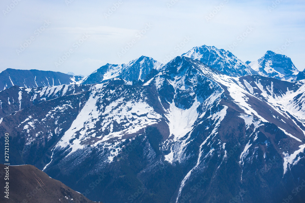 Snow-capped peaks. Caucasus Mountains. View from the Muhu Pass