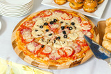 Slices of Pizza with Mozzarella cheese, pepper, pepperoni, Tomatoes, olives, Spices.
