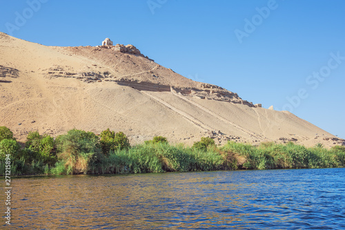 Qubbet el-Hawa and the bank of the Nile, while navigating on the river photo