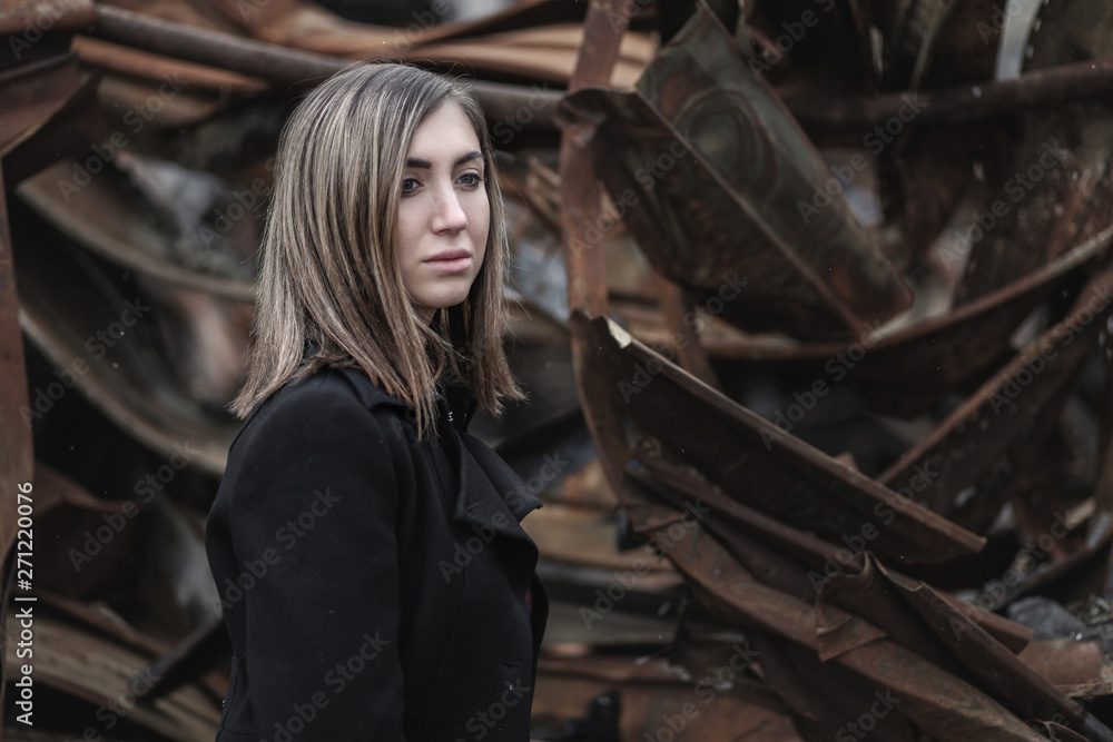 woman at the background of broken constructions woman at the background of broken constructions