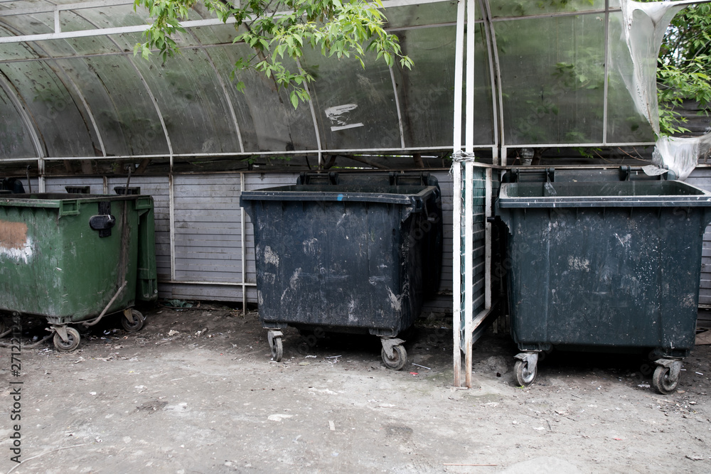 Dirty trash containers messy dirt everywhere Dirty trash containers messy dirt everywhere
