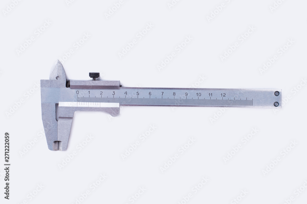Precision measurement device. Caliper isolated on white background. Metal equipment for engineering work. Precision measurement device. Caliper isolated on white background. Metal equipment for engineering work.