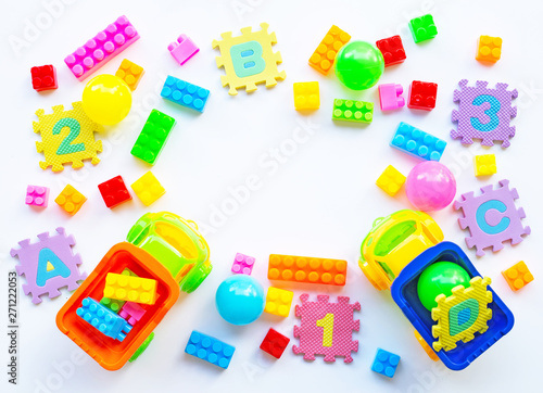 Colorful Kids toys on white background.