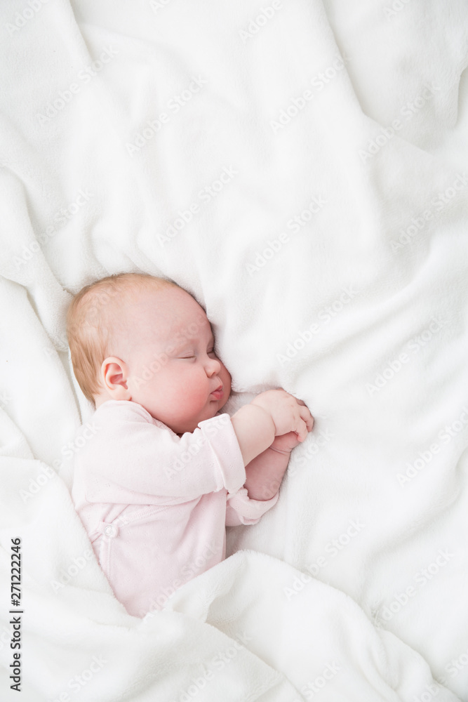 Baby Sleeping, 3 months old Kid in pink cloth Sleep on a white blanket, Child Asleep in bed Baby Sleeping, 3 months old Kid in pink cloth Sleep on a white blanket, Child Asleep in bed