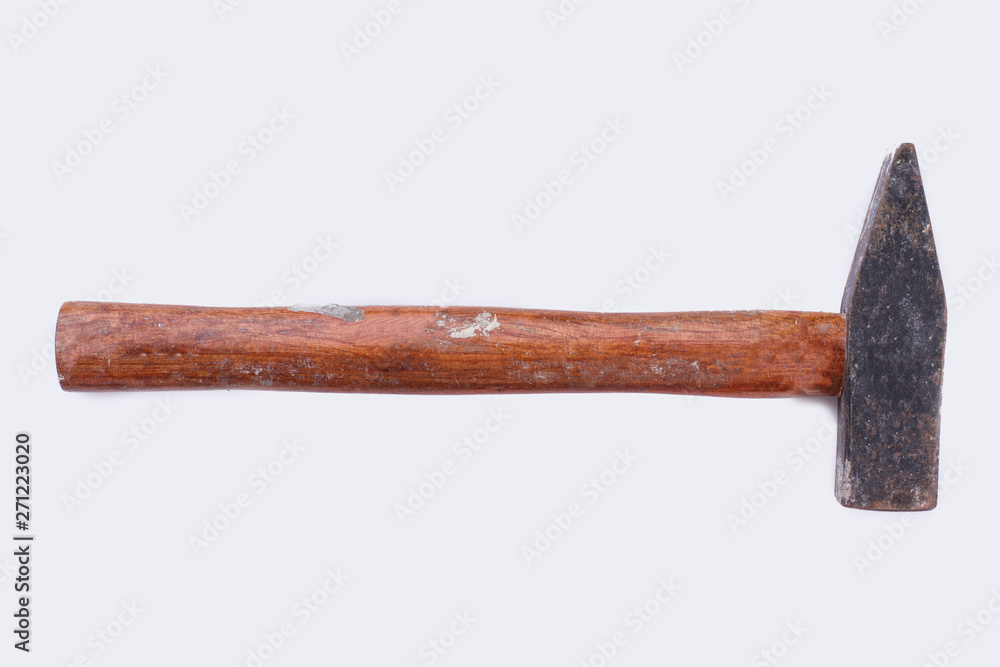 Old rusty hammer with wooden handle. Construction instrument isolated on white background. Old rusty hammer with wooden handle. Construction instrument isolated on white background.