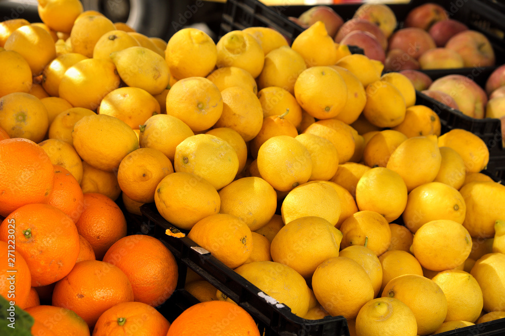 Fresh lemons and oranges on market stall in southern Spain