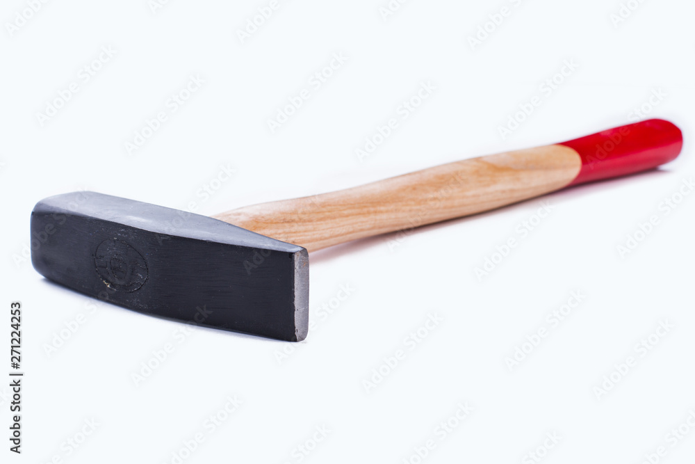 Metal mallet on white background. Steel hammer, studio shot. Building instrument, horizontal image. Metal mallet on white background. Steel hammer, studio shot. Building instrument, horizontal image.