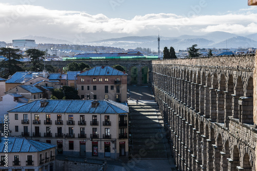 Aqueduct crossing the city on sunny day