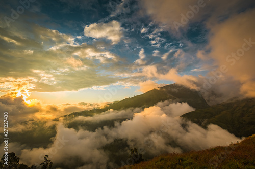 Mount Rinjani in the clouds at sunset, Lombok, Indonesia