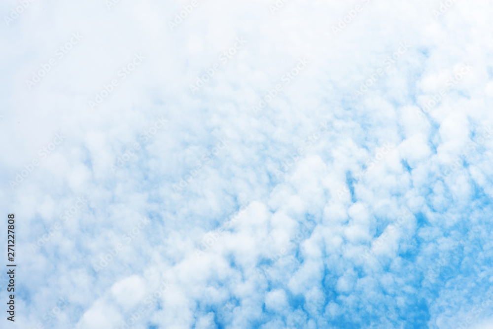 Beautiful light blue sky with white clouds