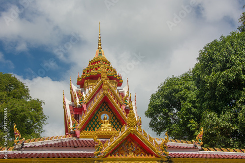 Golden root of Wat Sumret temple, Thailand photo