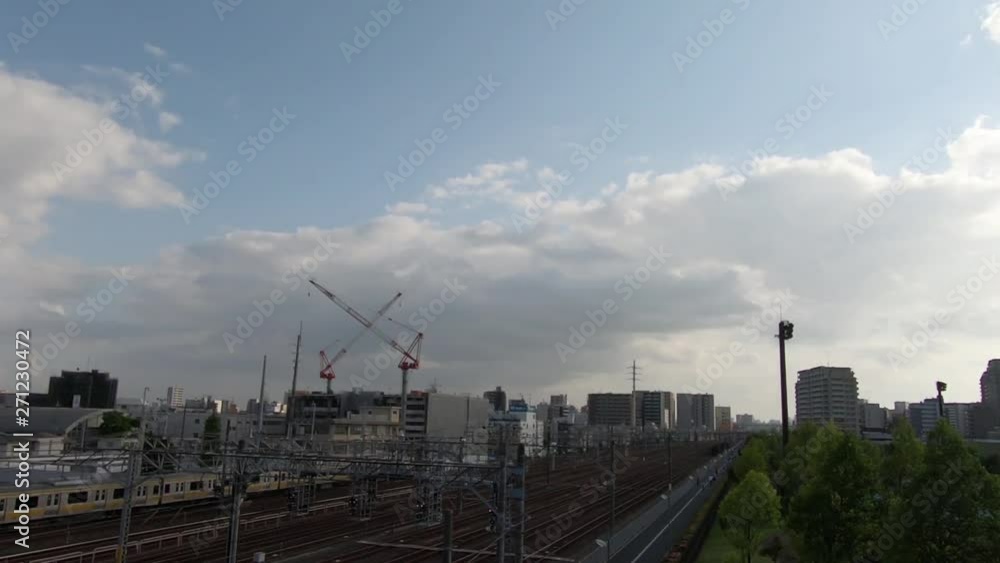 Japan city scenery. Commuter train in the evening.