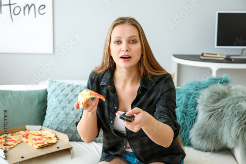 Beautiful woman eating tast...