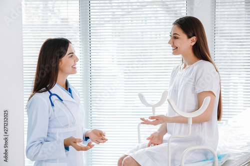 Female gynecologist working...