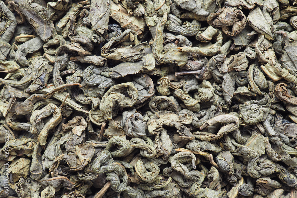 Dried green tea leaves close up. Photographed on a macro lens Dried green tea leaves close up. Photographed on a macro lens
